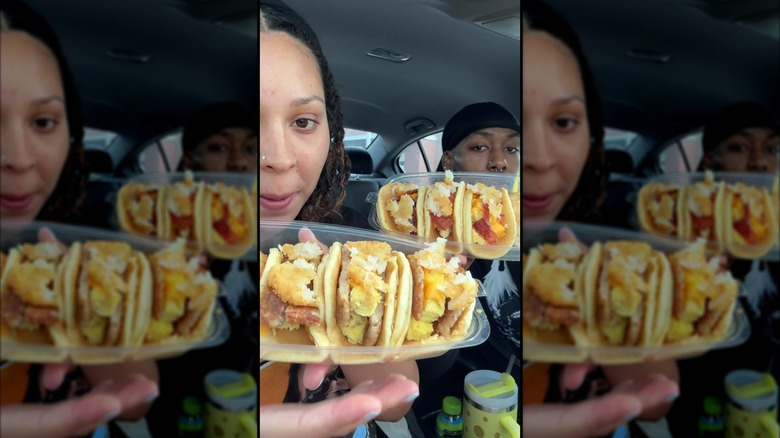 Person holding tray of McDonald's hotcakes that have been transformed into sausage and egg breakfast tacos