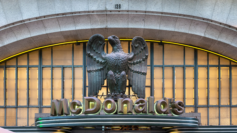 An eagle statue above Porto's McDonald's sign