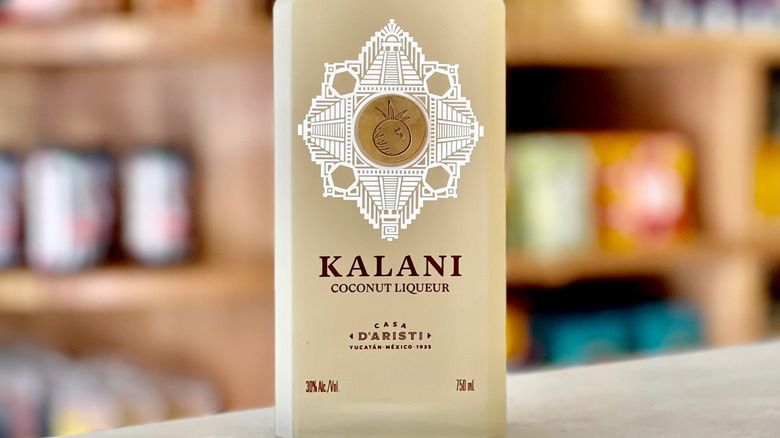 Close-up of Kalani bottle label against out of focus background.