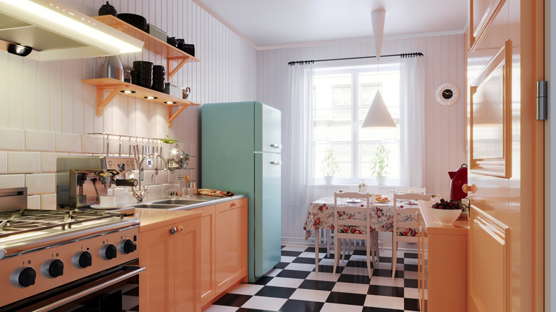 A kitchen with black and white checkered floors