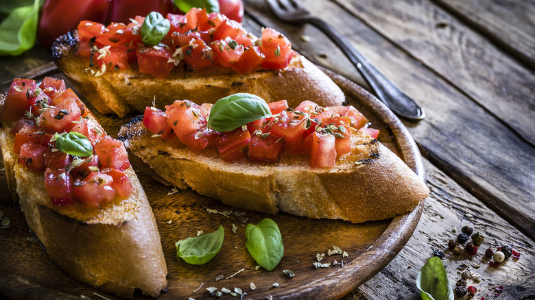 sliced baguette with bruschetta topping