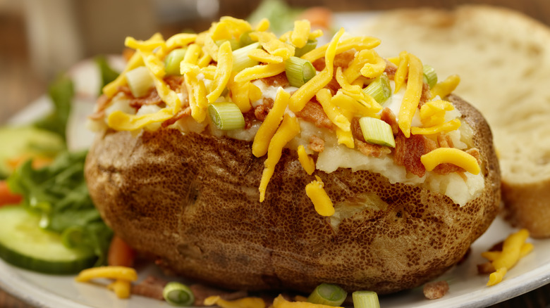 Baked potato loaded with cheese
