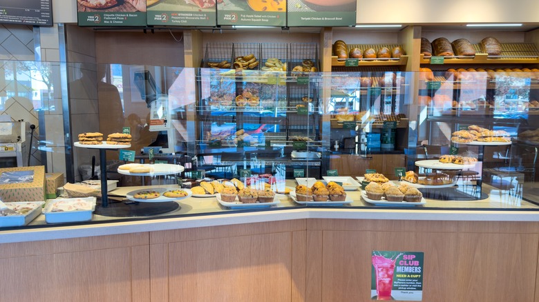 Panera Bread baked goods on display behind the counter
