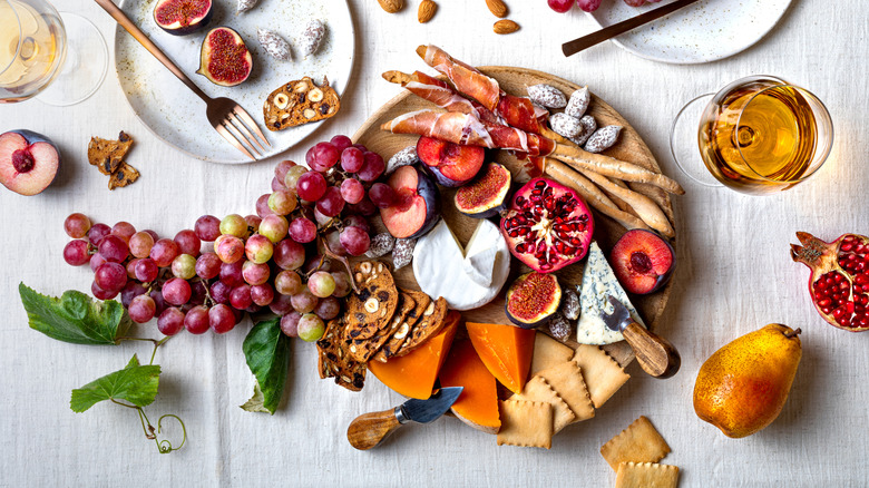 Charcuterie board with lots of fruit