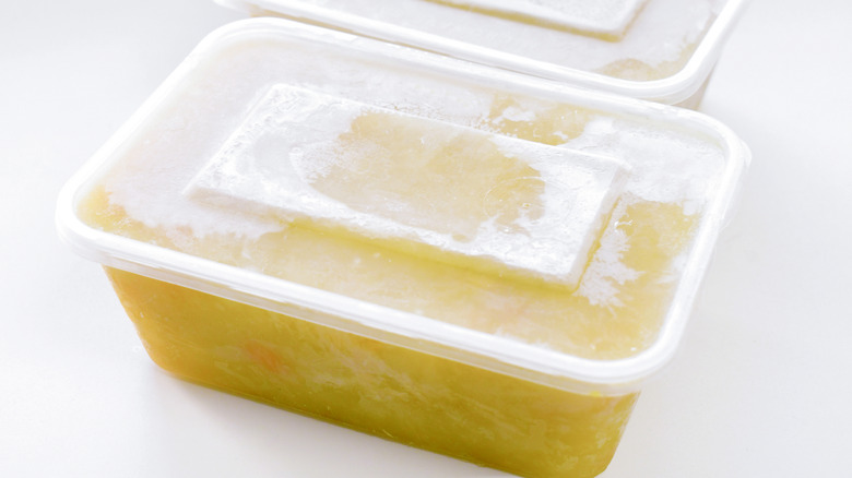 Frozen soup in plastic container