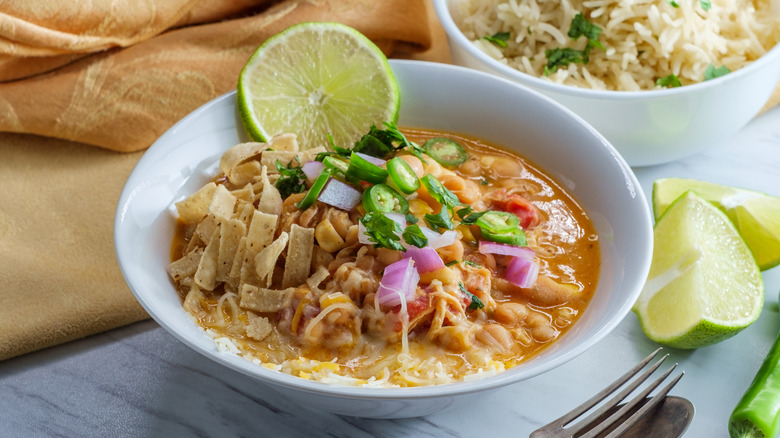White navy bean chili with variety of garnishes