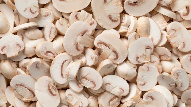 Pile of sliced button mushrooms