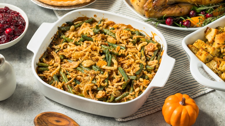 Green bean casserole in white casserole dish