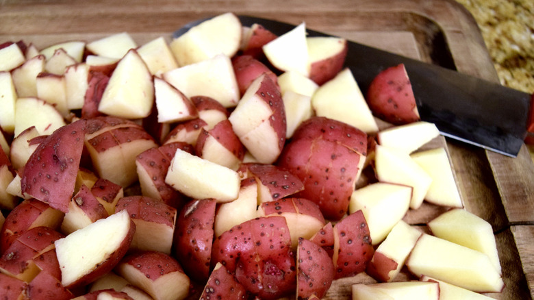 pile of cut red potatoes