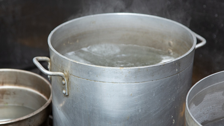 large stockpots in a kitchen