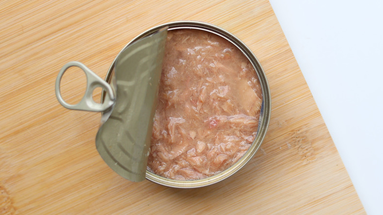 Opened can of tuna packed in water