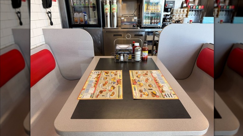 Waffle House booth with menus