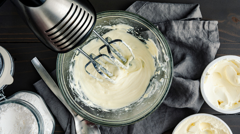 Frosting ingredients in metal mixer