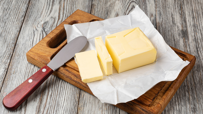 Butter on cutting board coming to temperature