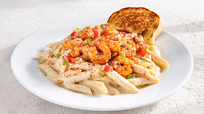 Cajun shrimp pasta on a white plate at Chili's
