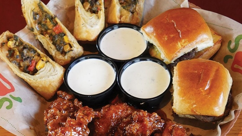 Chili's Triple Dipper on Chili's paper in a basket