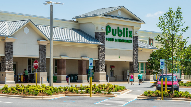 Exterior of Publix with customers on sunny day