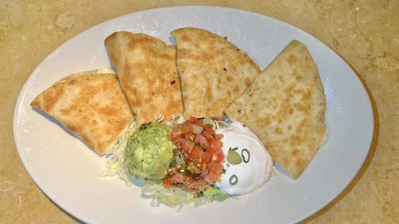 Quesadilla with guacamole and sour cream