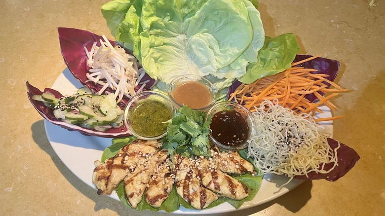 Thai Lettuce Wraps with Chicken with sauces on a plate