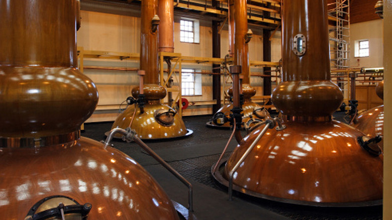Multiple stills in a whiskey distillery