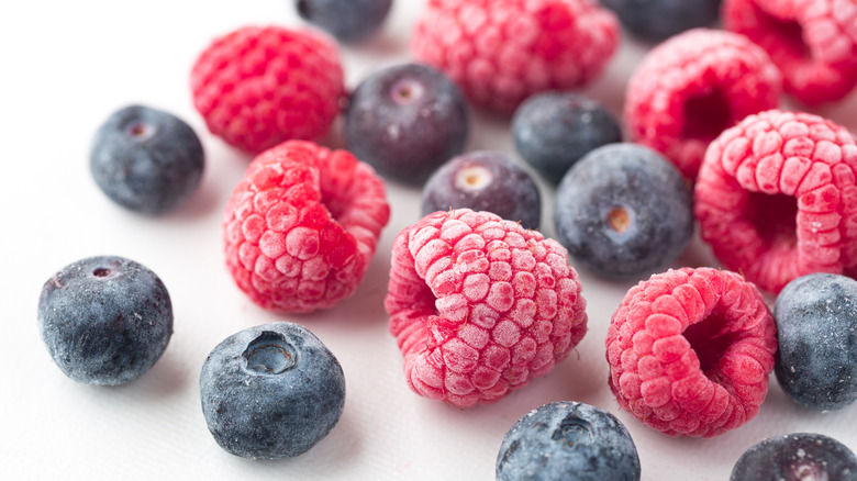 Close up of fresh raspberries and blueberries