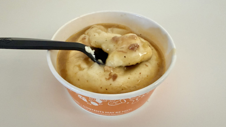 Mashed Potatoes and Cajun Gravy on a spoon