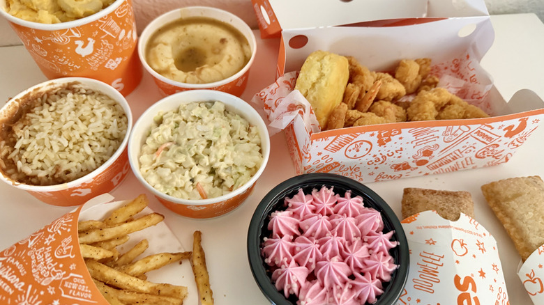 Different Popeyes menu items on a table