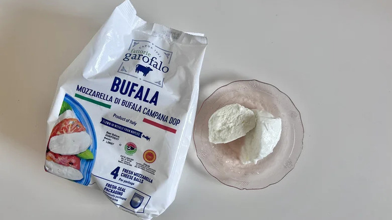 Sliced Fattorie Garafalo Mozzarella Di Bufala Campana on a table