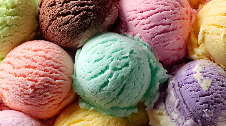 scoops of different ice cream flavors bunched together