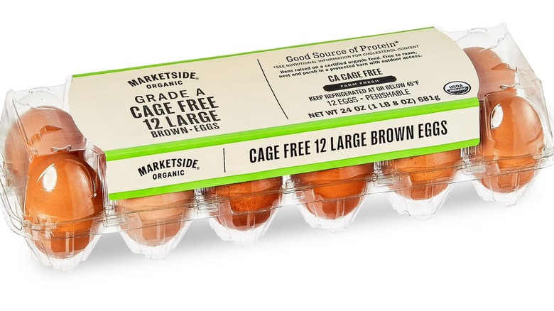 Clear carton of Marketside organic Grade A cage free brown eggs