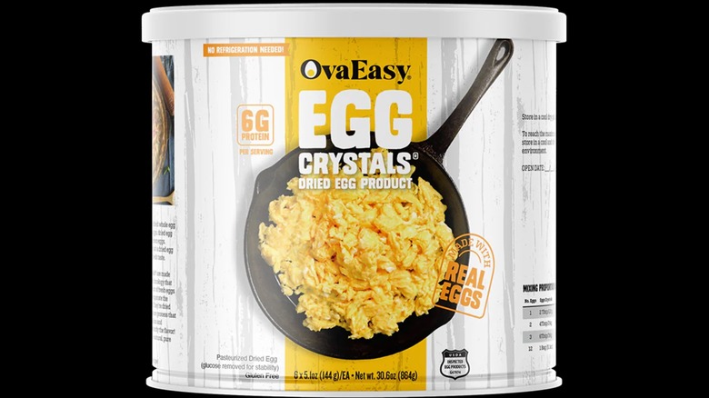 Canister of OvaEasy Egg Crystals dried egg product on a black background