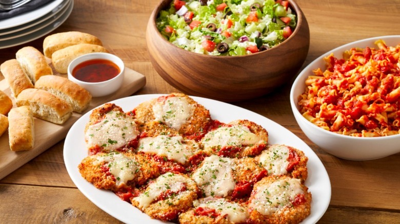 table filled with Italian dishes at restaurant