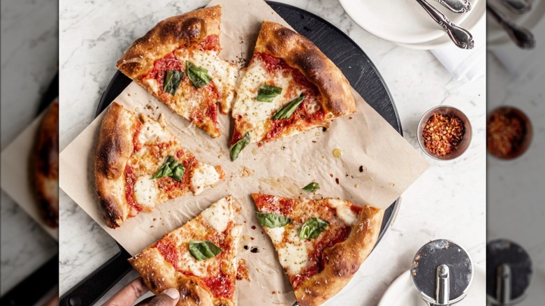 aerial view of a pie of pizza on a table