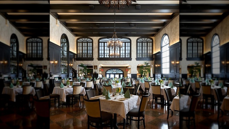 Mirrored image of the inside of Gargiulos restaurant with chandelier