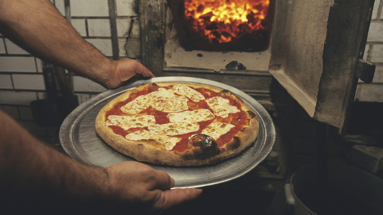 Pizza cooked in a brick oven at Lombardi's pizza restaurant