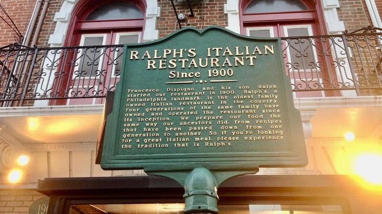 Green plaque for Ralph's Italian Restaurant outside building