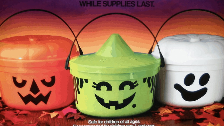 Close up of McDonalds Boo Buckets: pumpkin, witch and ghost