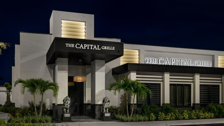 The exterior of The Capital Grille restaurant at nighttime