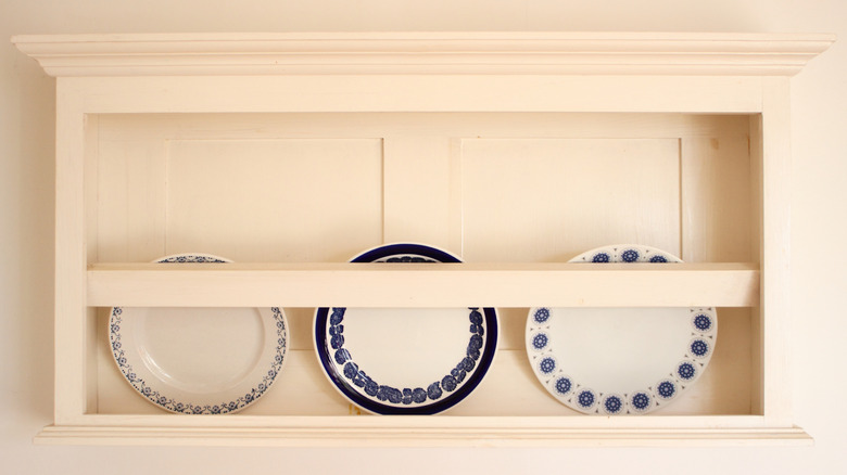 Decorative plate racks placed on a wall holder