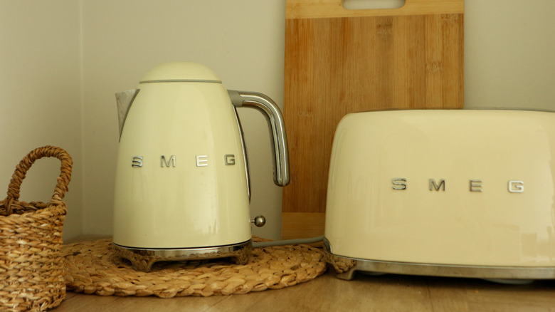 Retro toaster and kettle placed on kitchen countertop