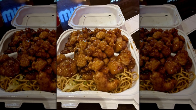 Panda Express bigger plate with three orders of orange chicken and chow mein