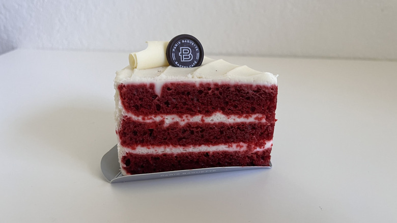 Red velvet cake piece on a table