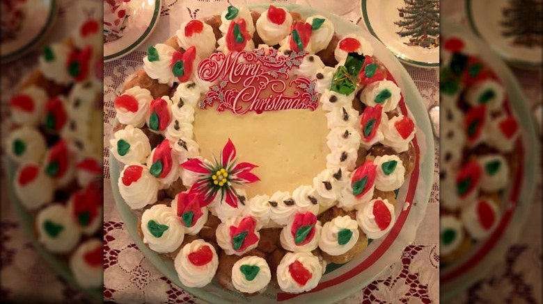 A Christmas-themed St. Honore cake on a festive table