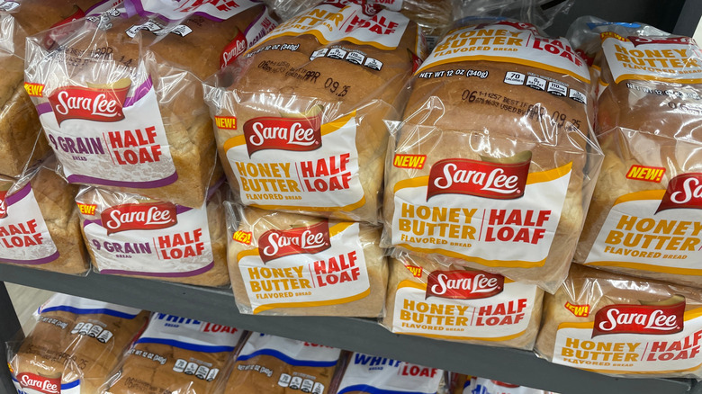 Loaves of Sara Lee bread on grocery store shelf