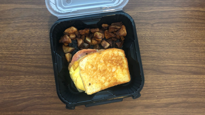Denny's Moons Over My Hammy in to-go box.