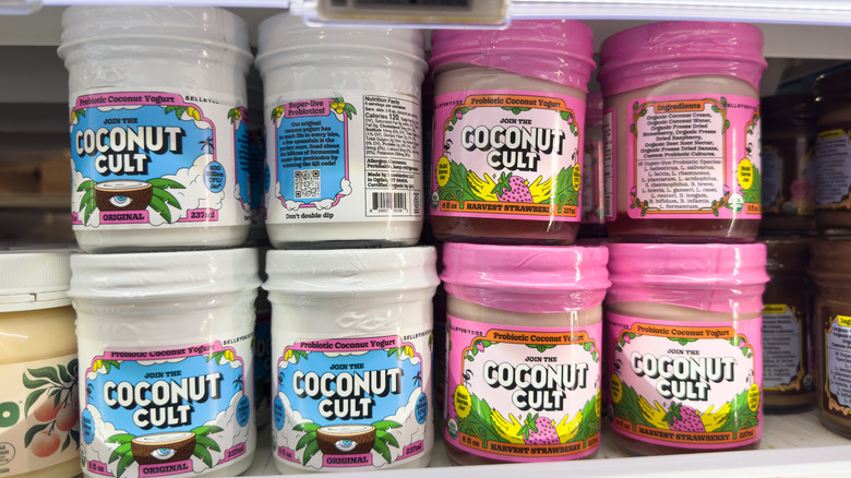 Coconut Cult yogurts in fridge section at grocery store