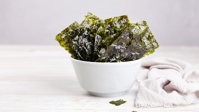 Seaweed snacks arranged in small white bowl