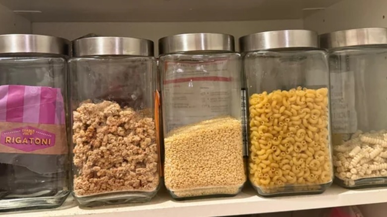 Glass jars from Costco turned into pantry canisters with dried goods