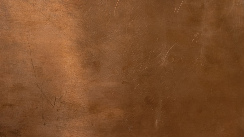 Slab of copper with scratches