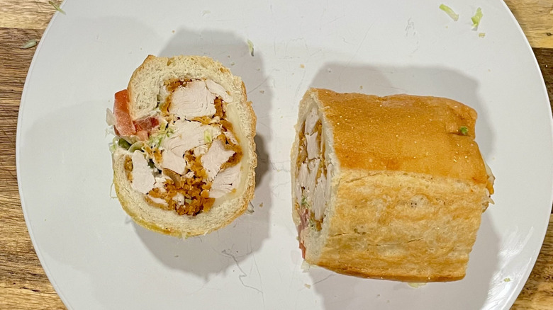 Sliced cross section of the chicken tender sub on a plate